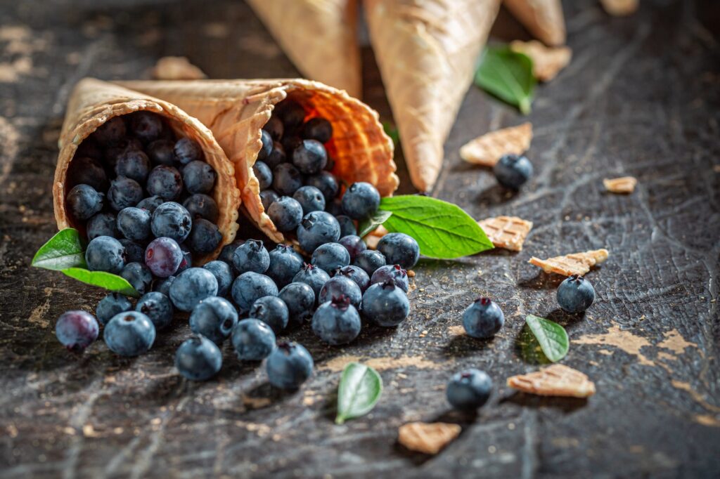 Closeup of blueberries in waffels as concept of ice cream